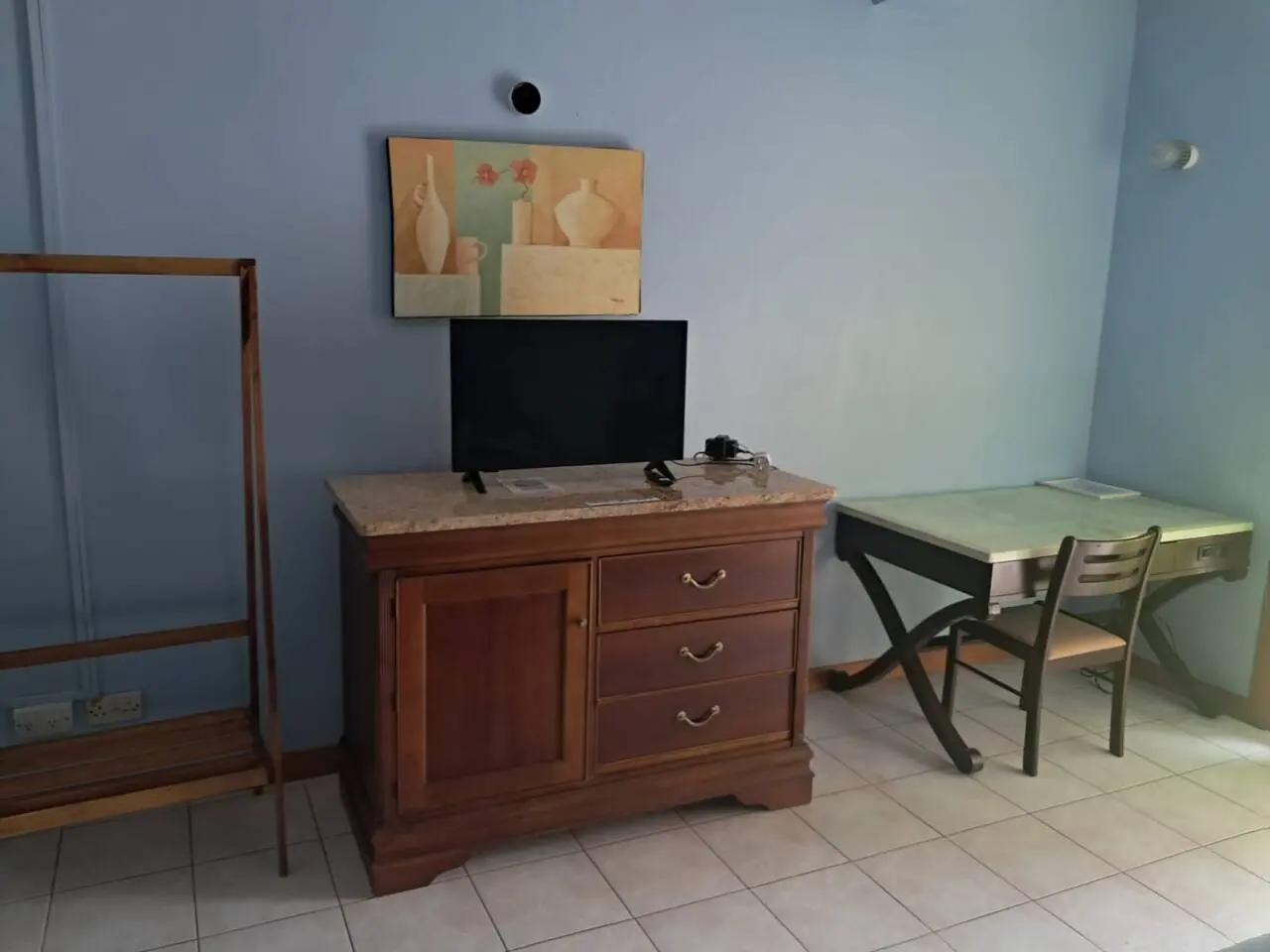 Dresser with TV and dining nook