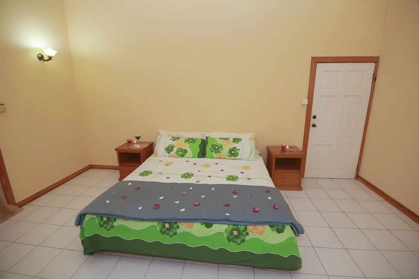 Guest room with double bed and bedside tables